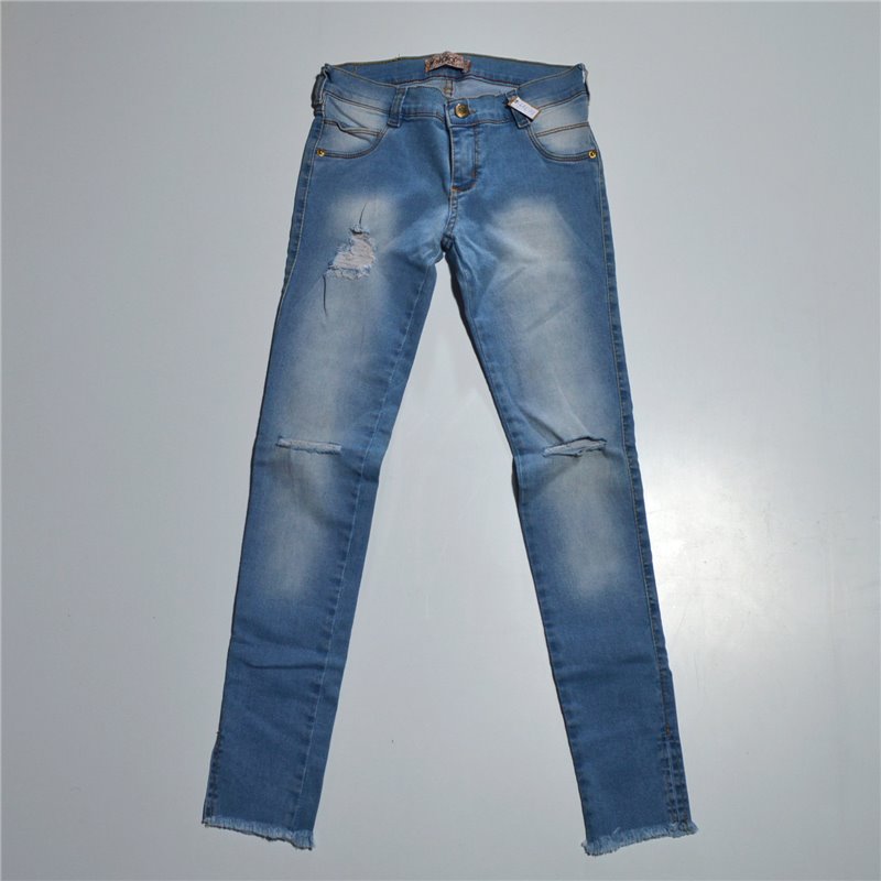 Nena pantalon jean elastizado rotura puños abiertos